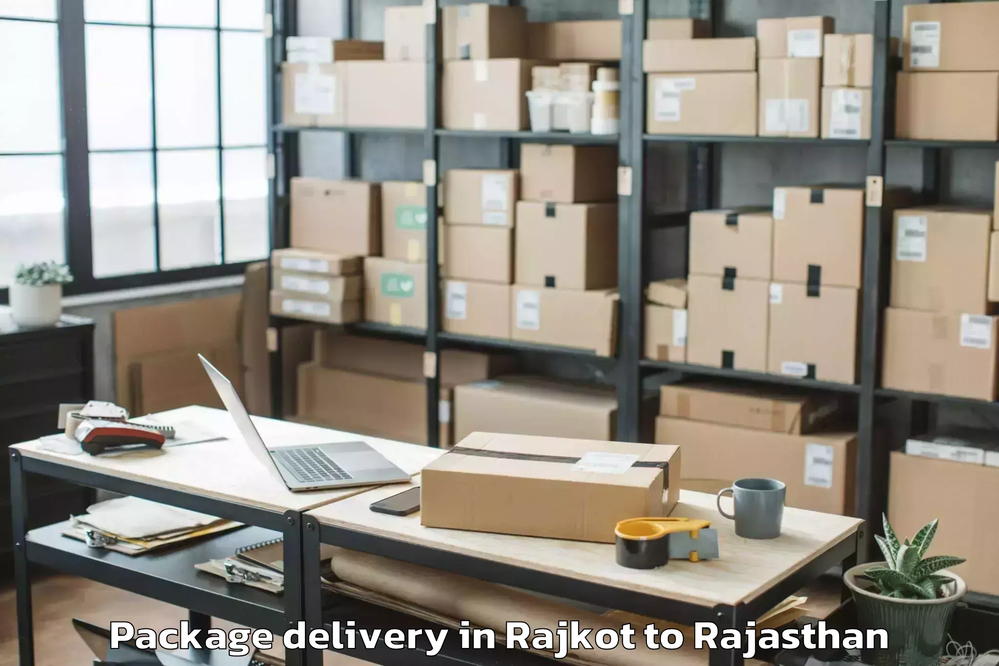 Book Rajkot to Jk Lakshmipat University Jaipu Package Delivery Online